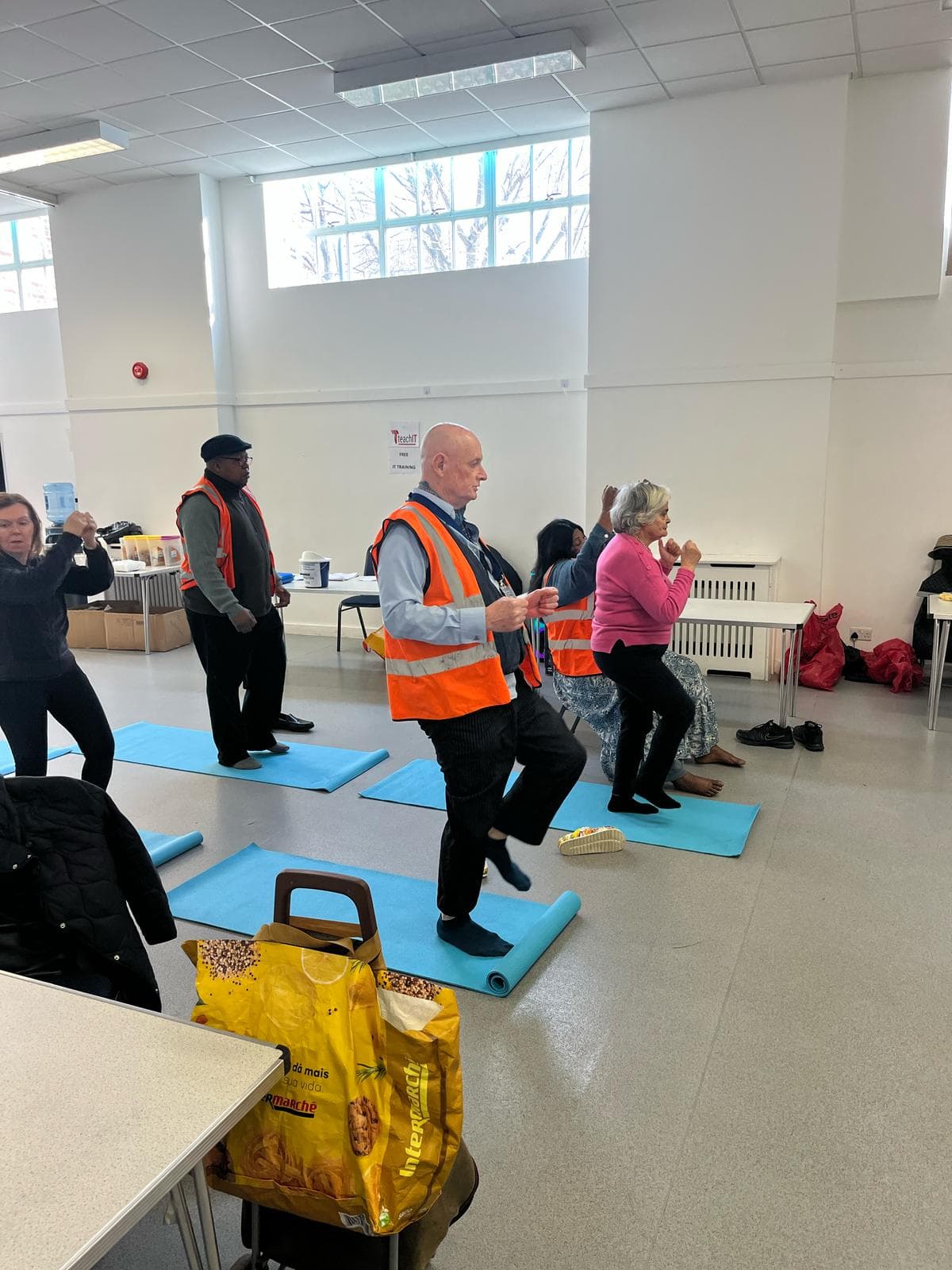 Group fitness session with volunteers