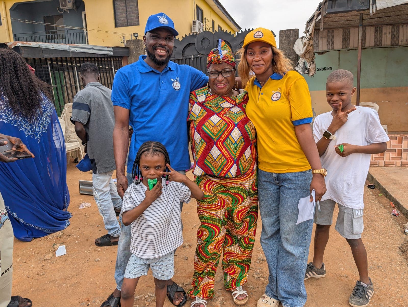 Mission team with local families and children