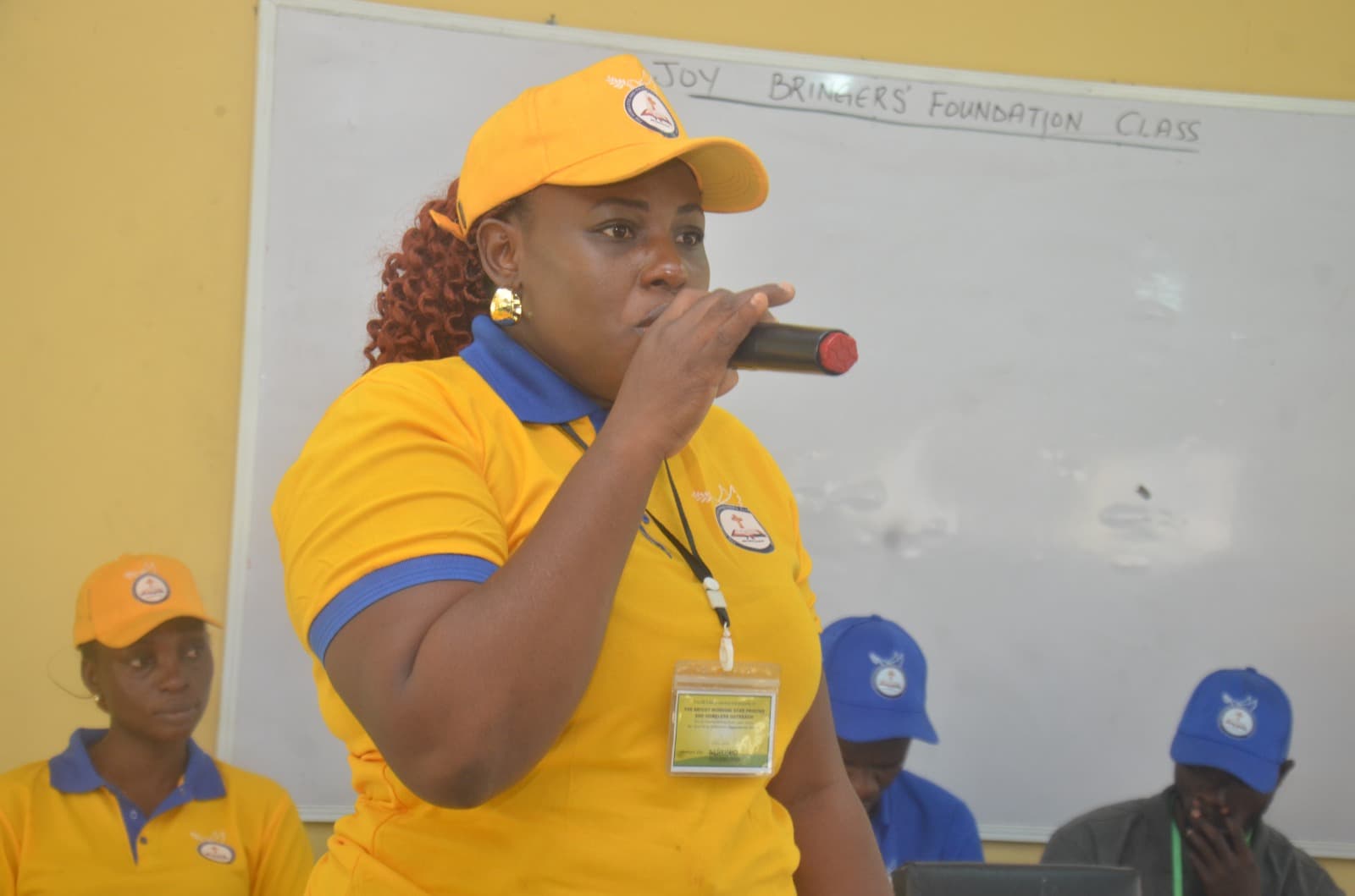 Team member delivering presentation to inmates