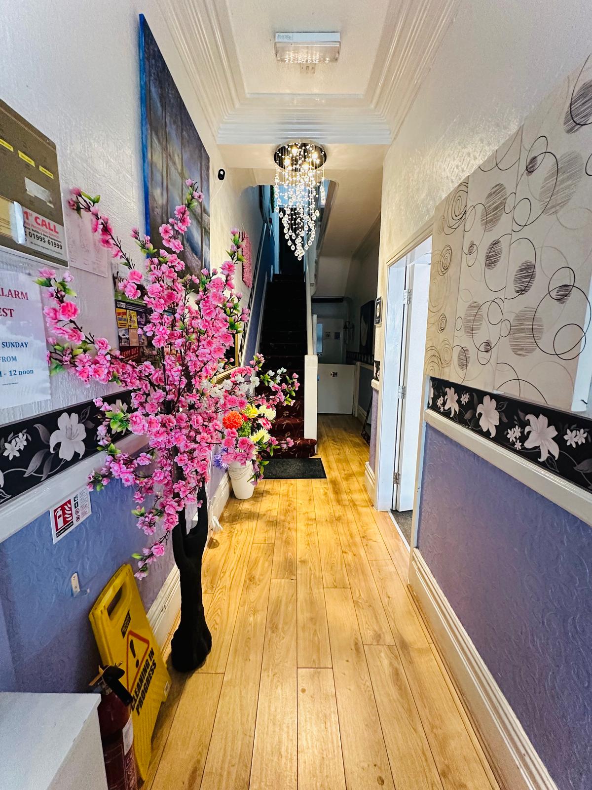 Interior hallway with decorative elements and flowers