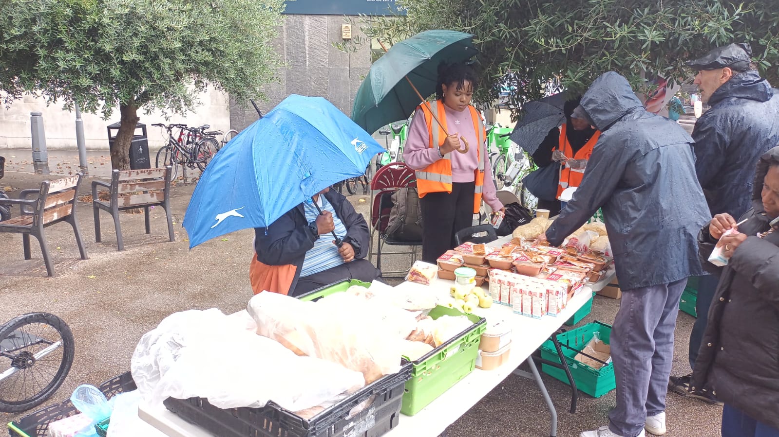 Homeless Outreach - Volunteers serving food to community members
